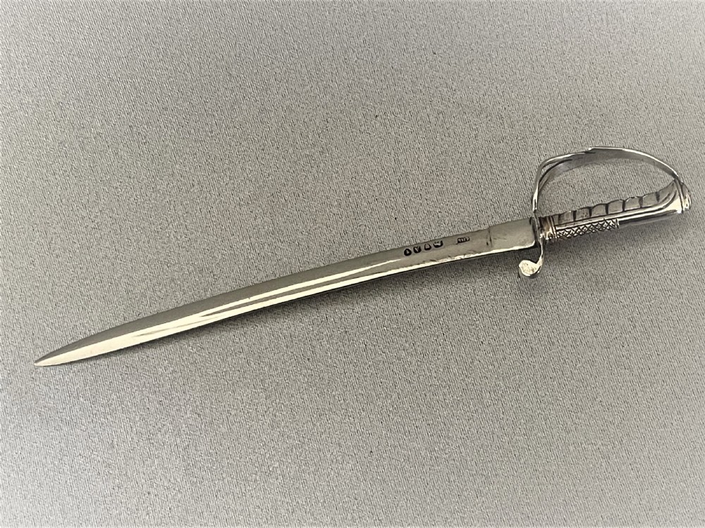A superb Victorian silver miniature sword letter opener