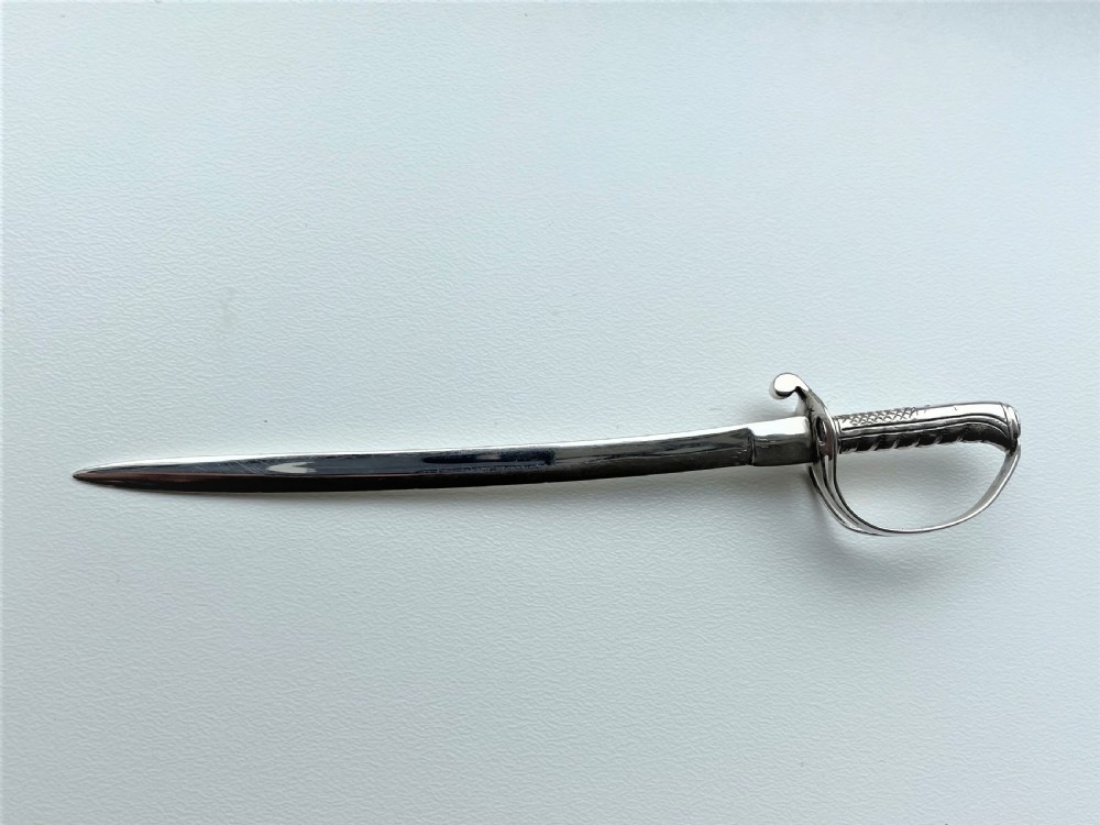 A superb Victorian silver miniature sword letter opener View V