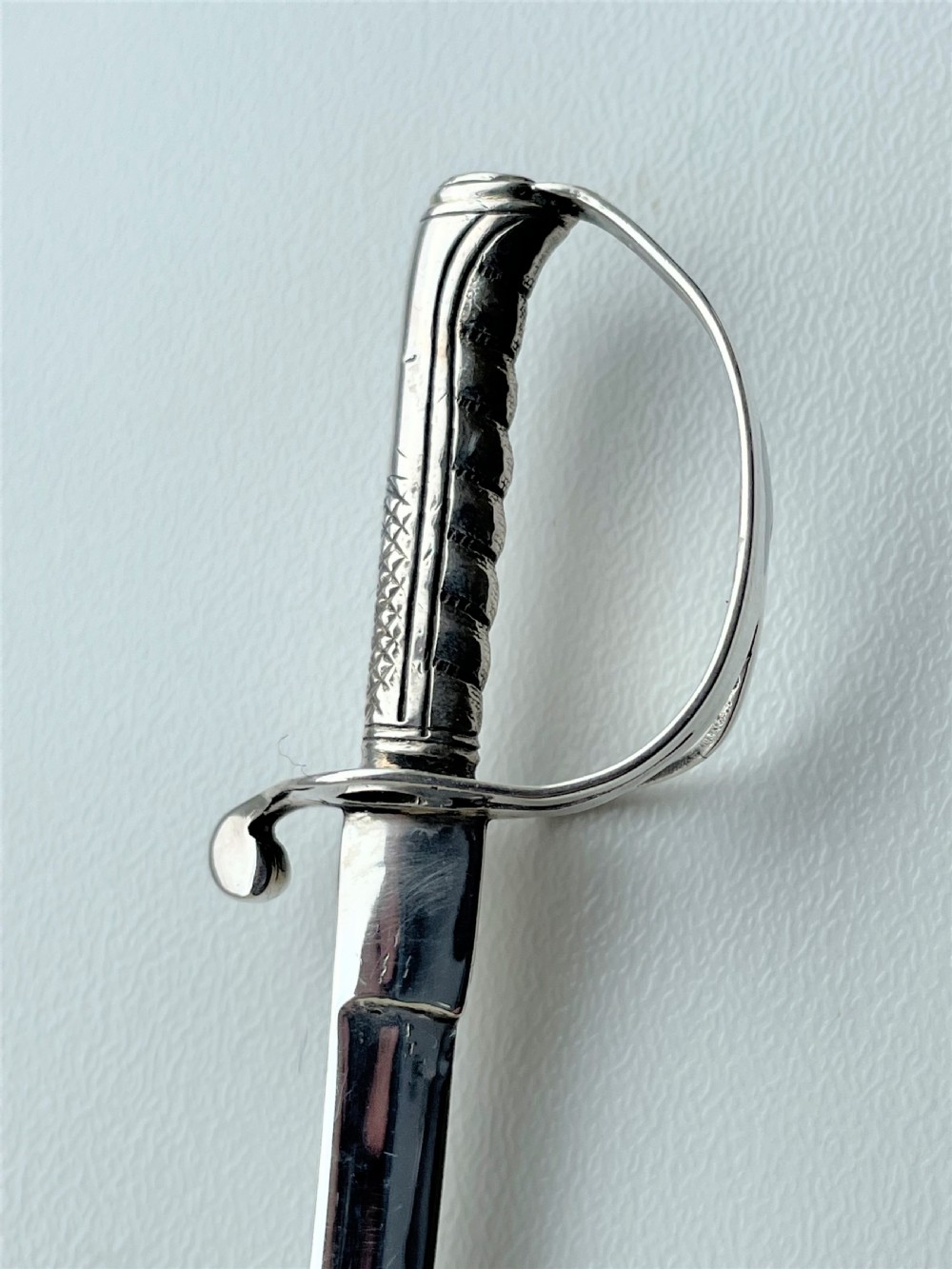 A superb Victorian silver miniature sword letter opener View VI