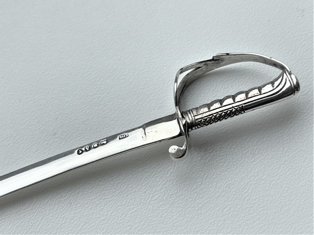 A superb Victorian silver miniature sword letter opener View VII
