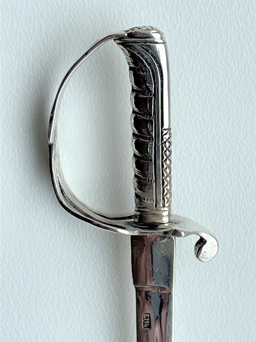 A superb Victorian silver miniature sword letter opener View VIII