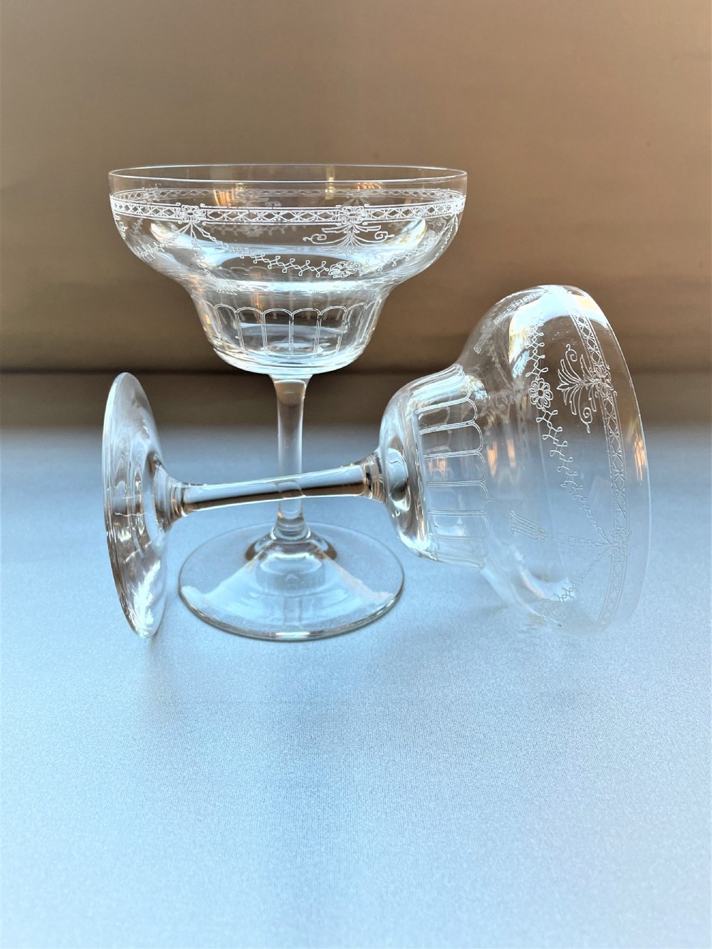 An elegant pair of etched Edwardian champagne coupes View II