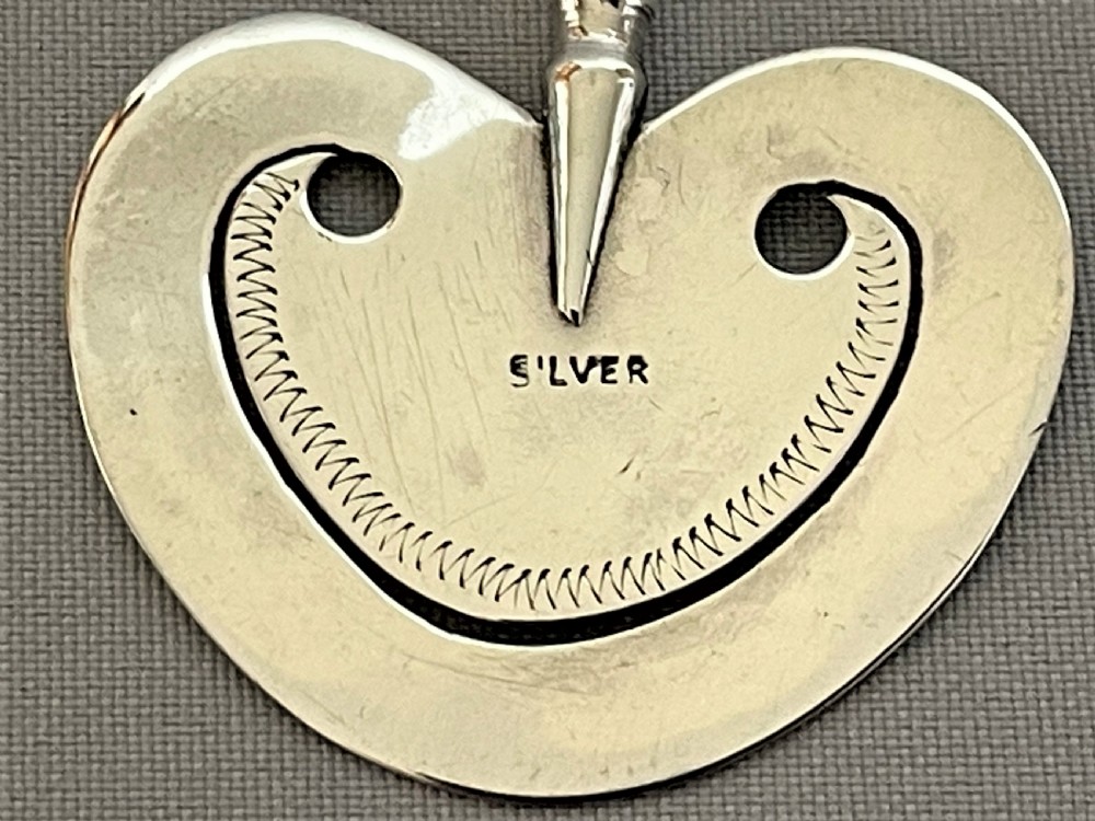 A charming heart shaped silver bookmark View II