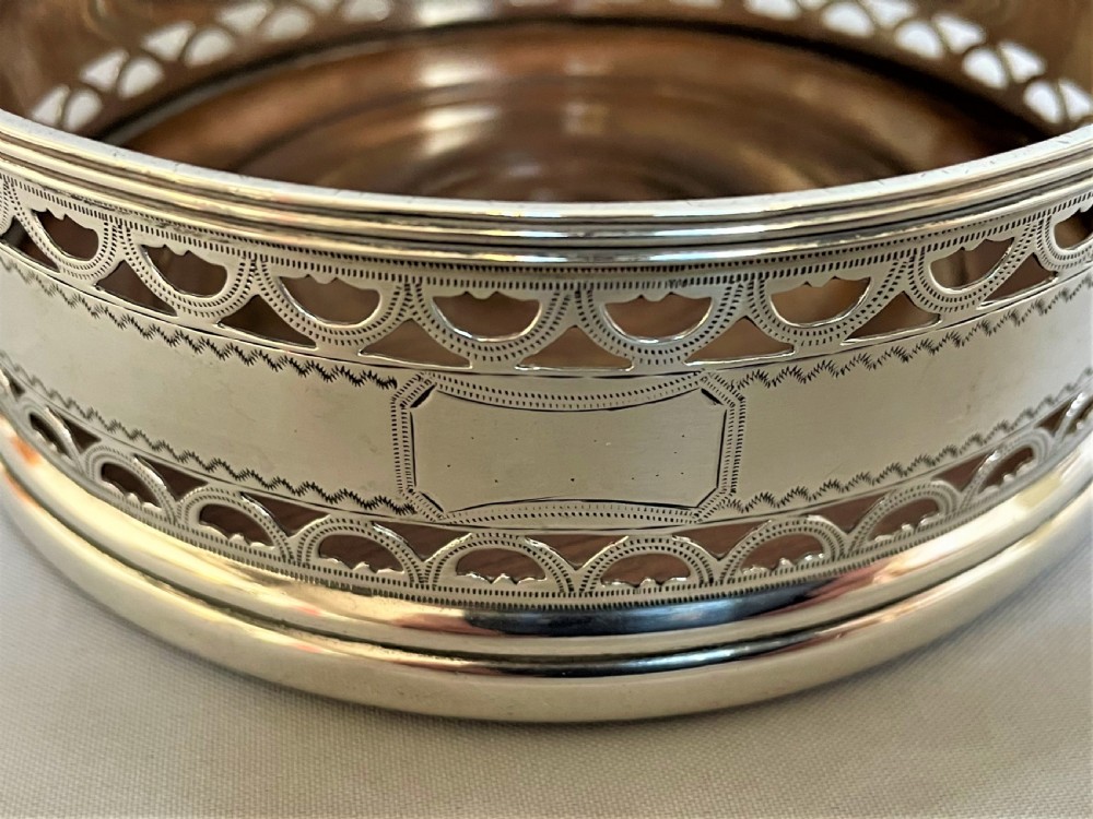 A hallmarked silver wine bottle/decanter coaster View V