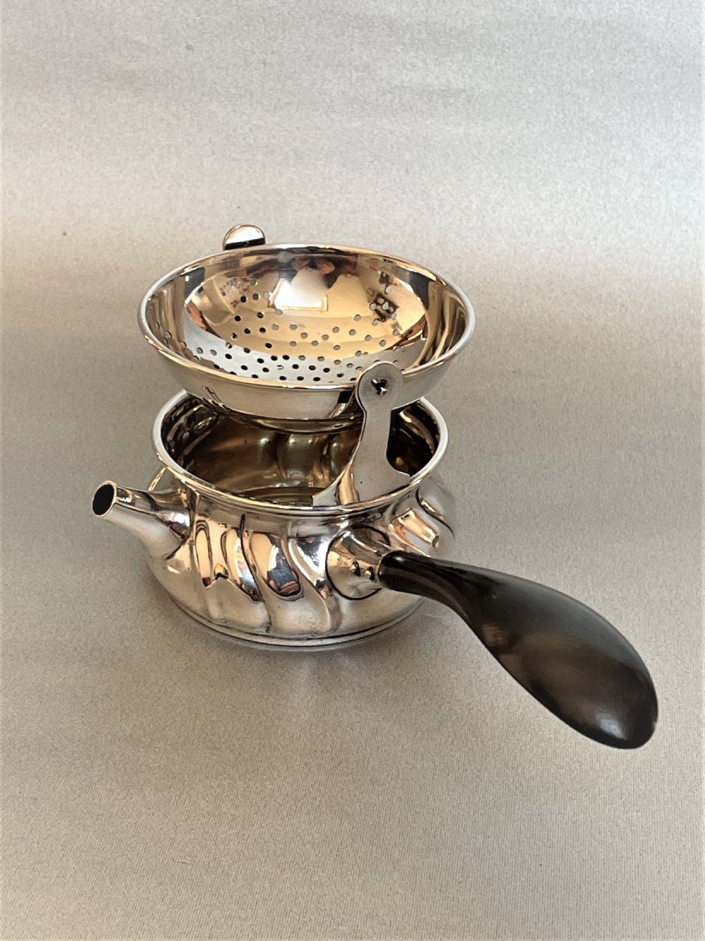 A superb Danish silver tea strainer & cup View II