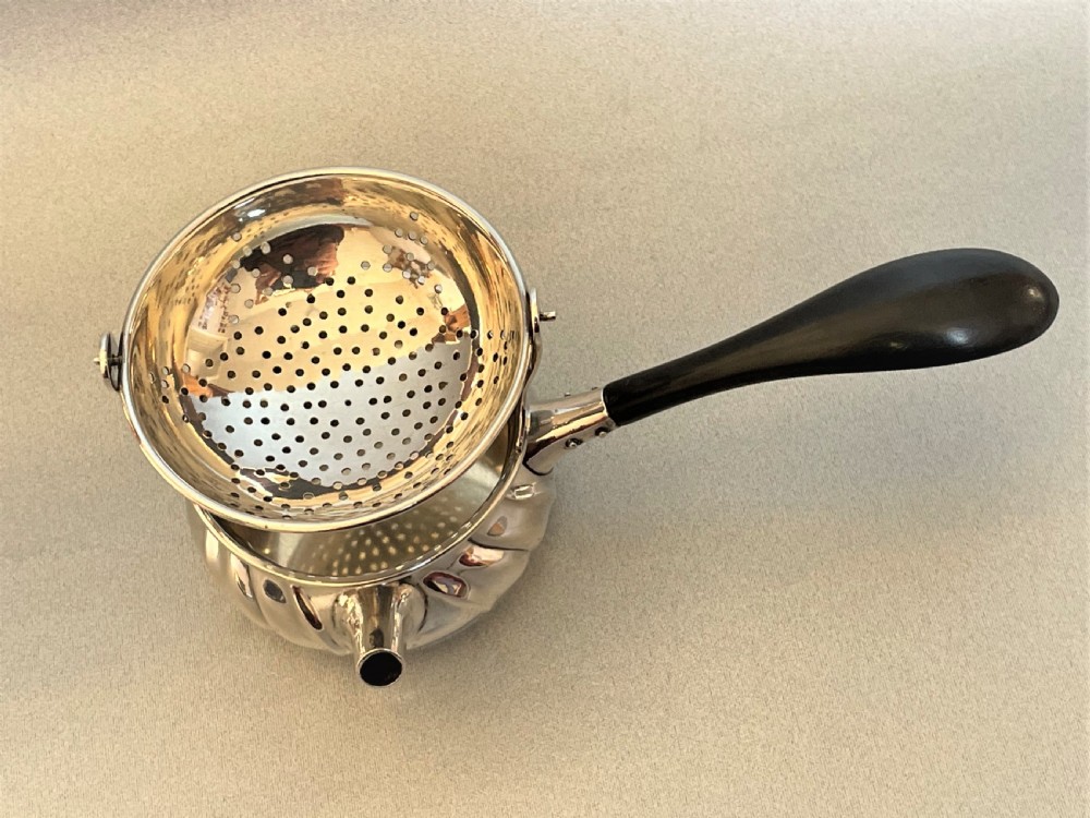 A superb Danish silver tea strainer & cup View III