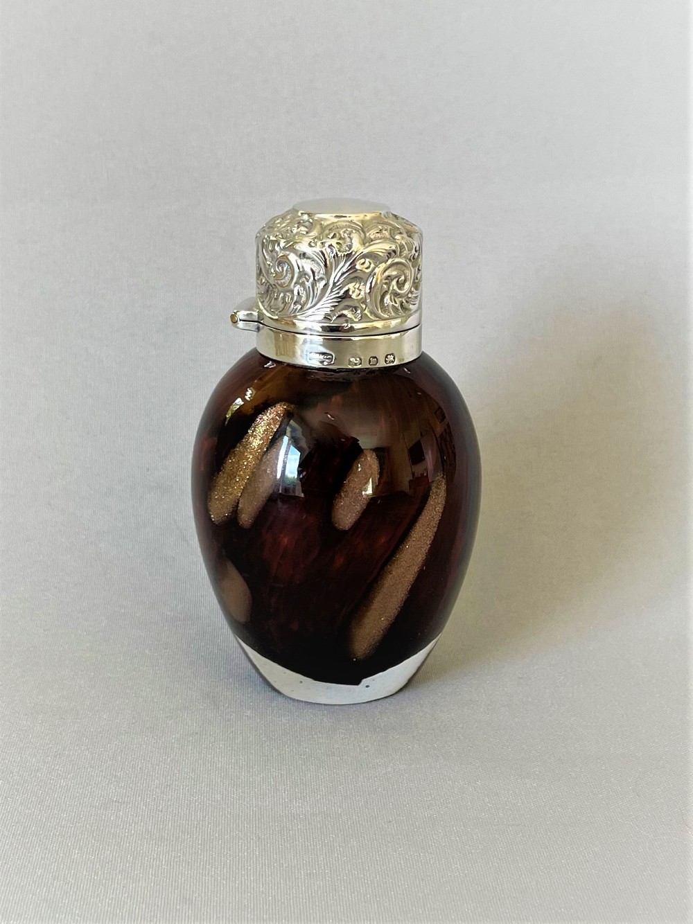 An unusual Victorian Silver Mounted Scent Bottle