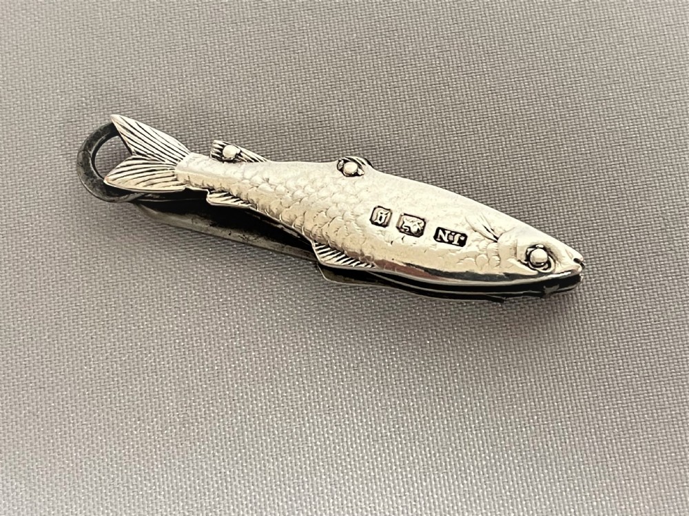A rare Victorian novelty silver fruit knife/button hook combo View II