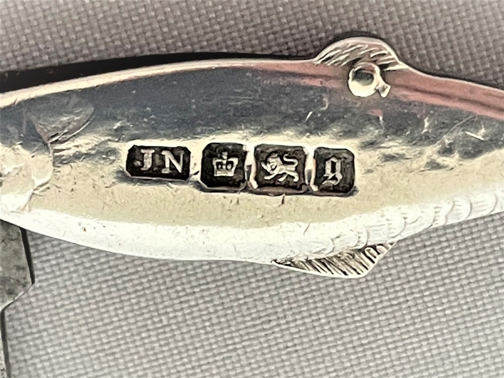 A rare Victorian novelty silver fruit knife/button hook combo View IV