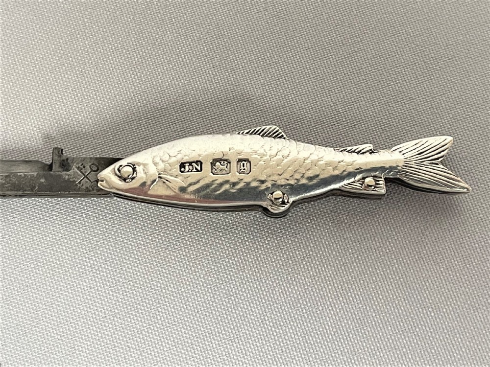 A rare Victorian novelty silver fruit knife/button hook combo View VI