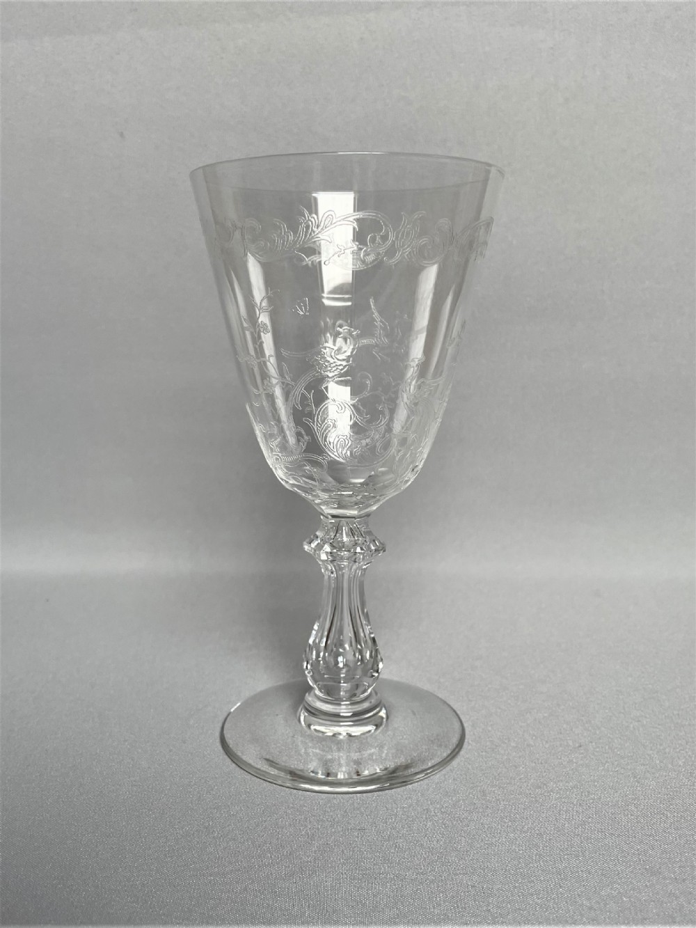 A delightful Edwardian etched & cut wine goblet