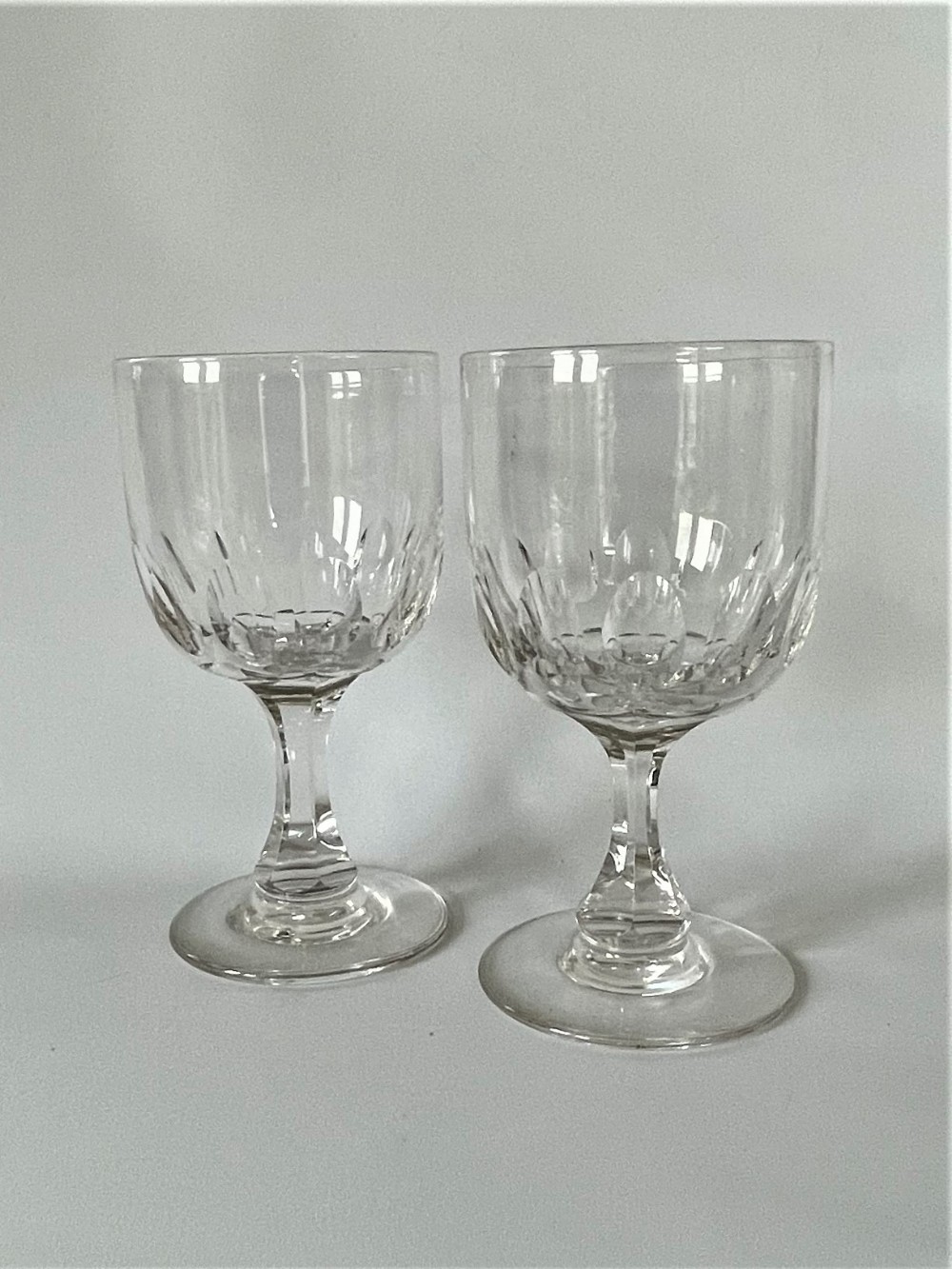 A handsome pair of large Victorian cut glass wine goblets
