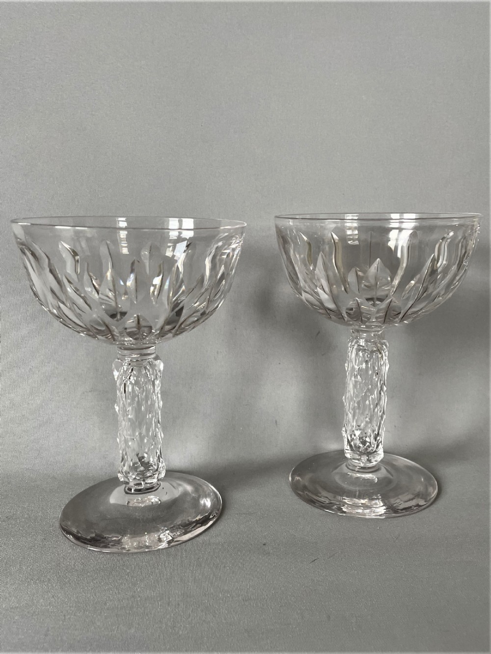 A gorgeous pair of Victorian 'bark stem' cut glass champagne coupes