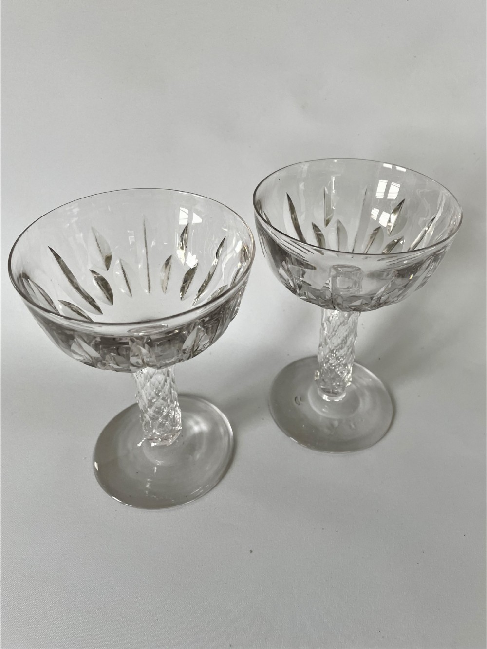 A gorgeous pair of Victorian 'bark stem' cut glass champagne coupes View III