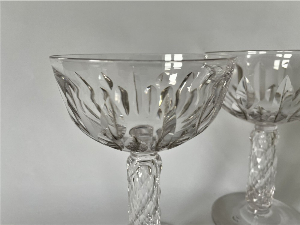 A gorgeous pair of Victorian 'bark stem' cut glass champagne coupes View V