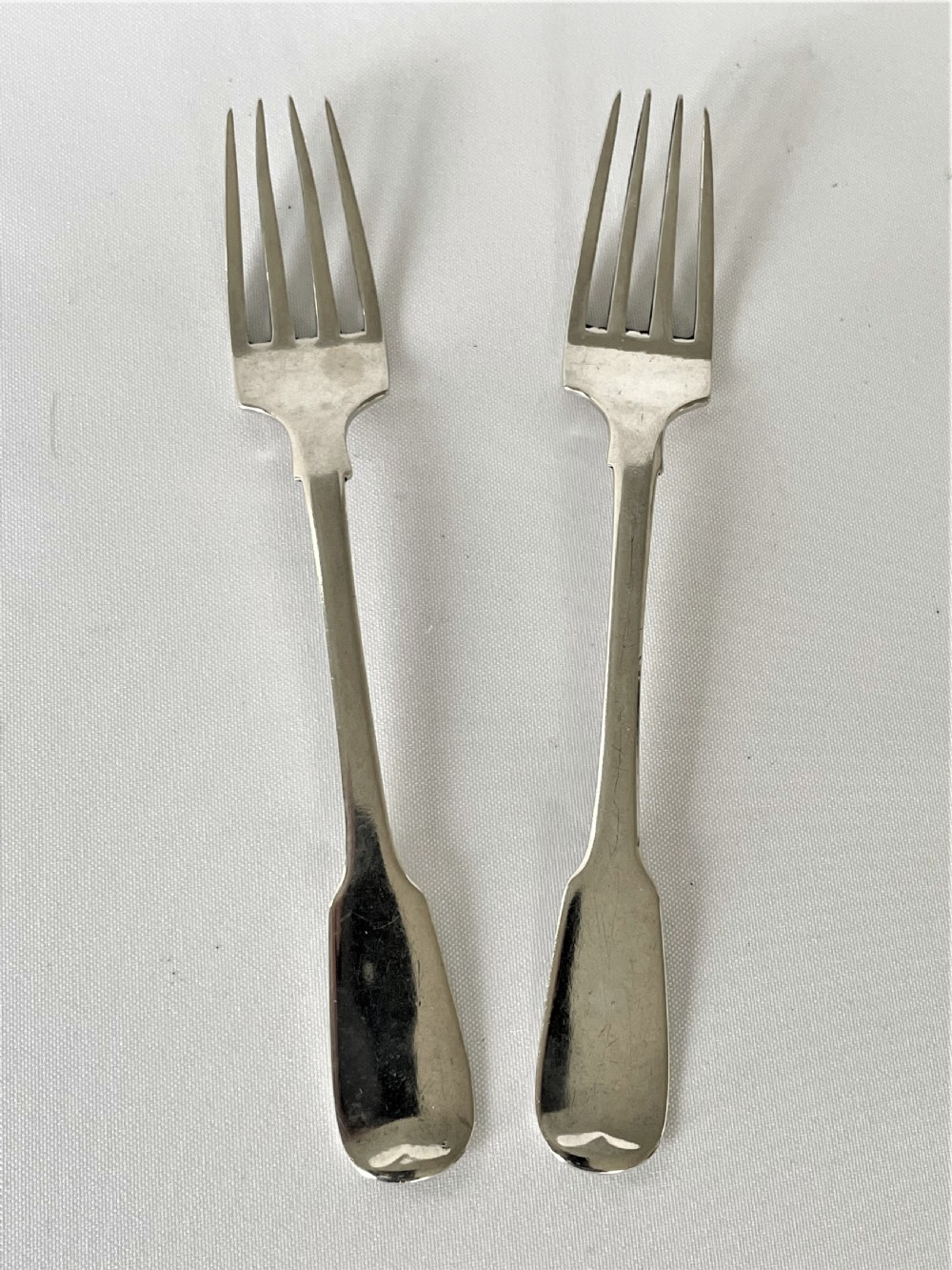 A rare pair of Irish Georgian silver oyster forks