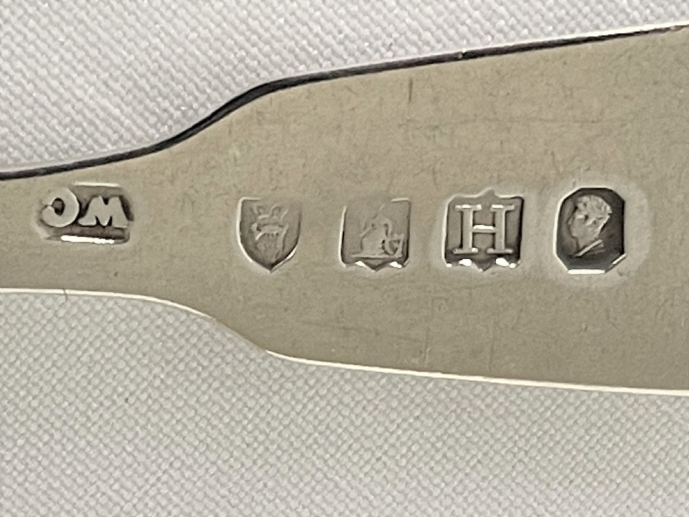 A rare pair of Irish Georgian silver oyster forks View III