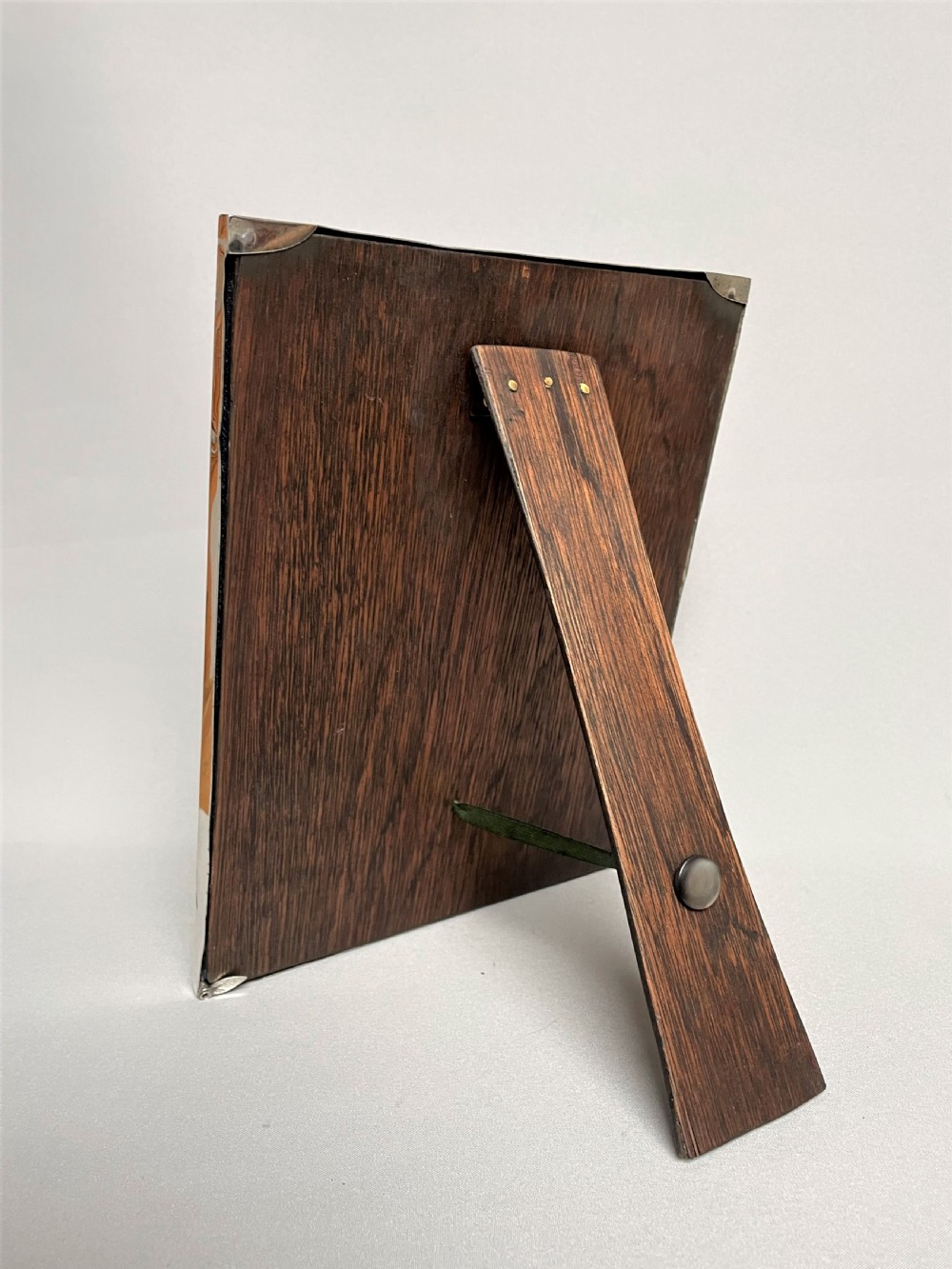 A large silver photo frame with unusual silver mount View IV