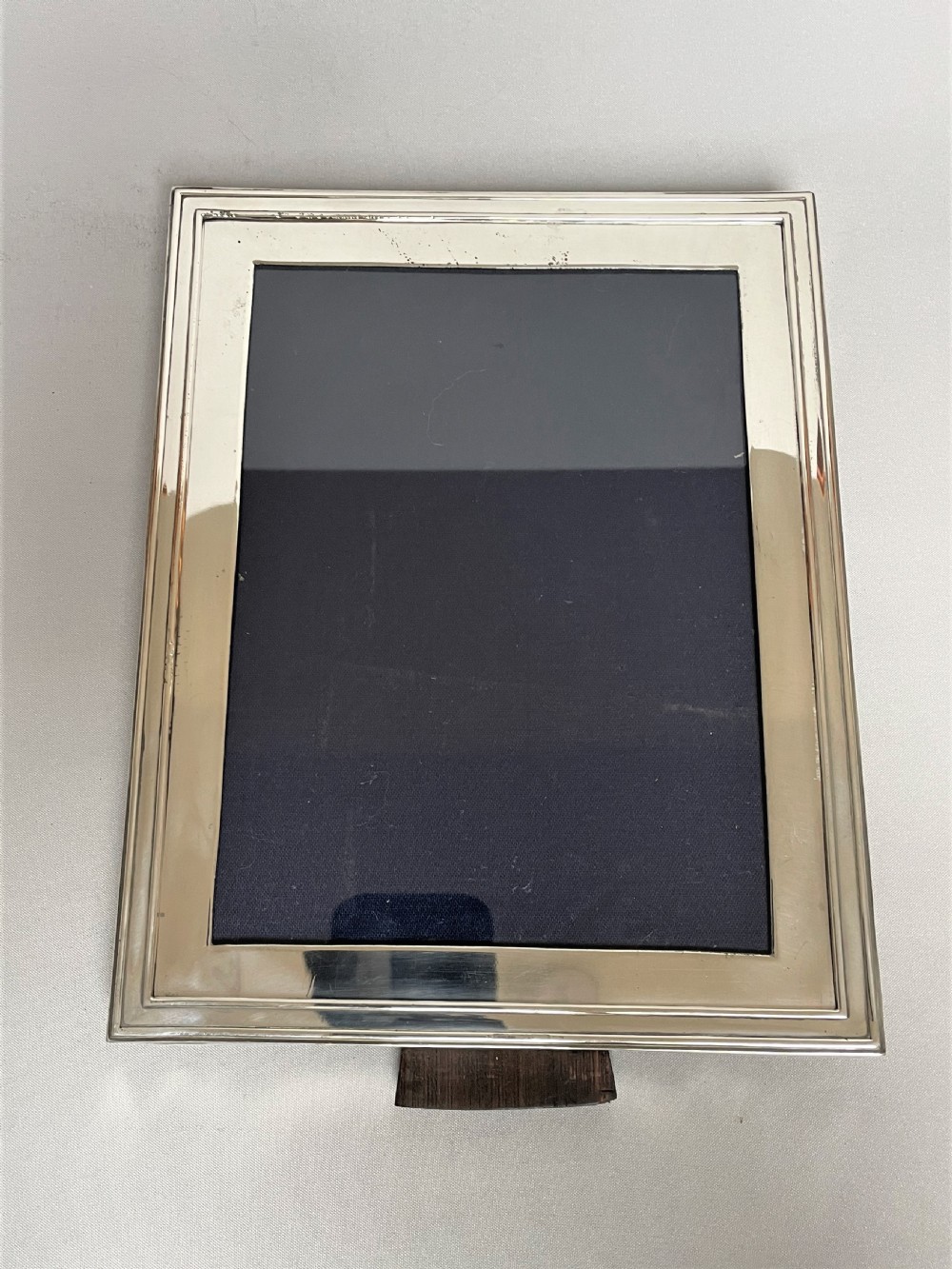 A large silver photo frame with unusual silver mount View VIII
