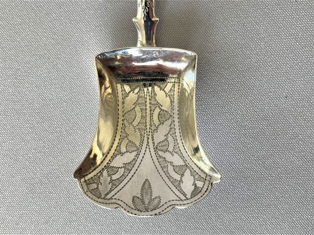 A gorgeous Georgian silver caddy spoon View II