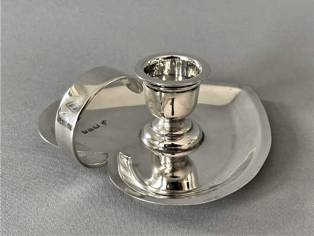 A lovely Chester silver heart shaped chamber stick View V