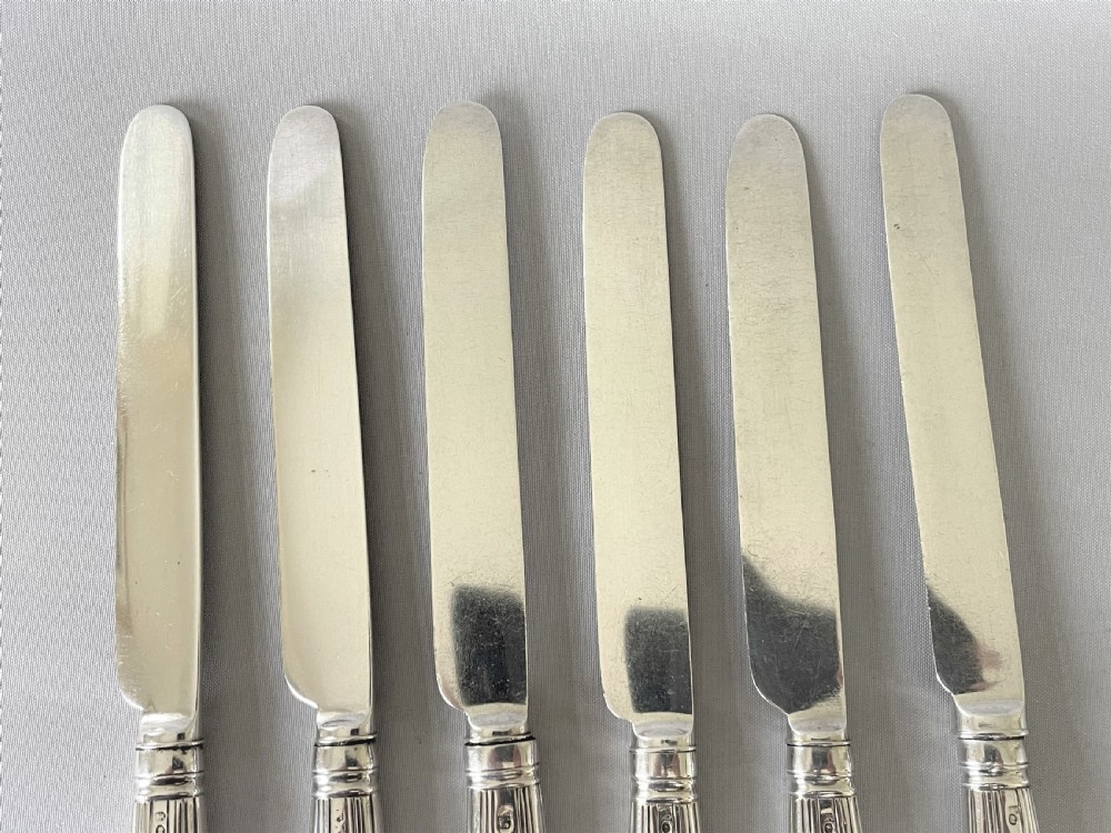 A rare set of 6 Georgian silver knives View II