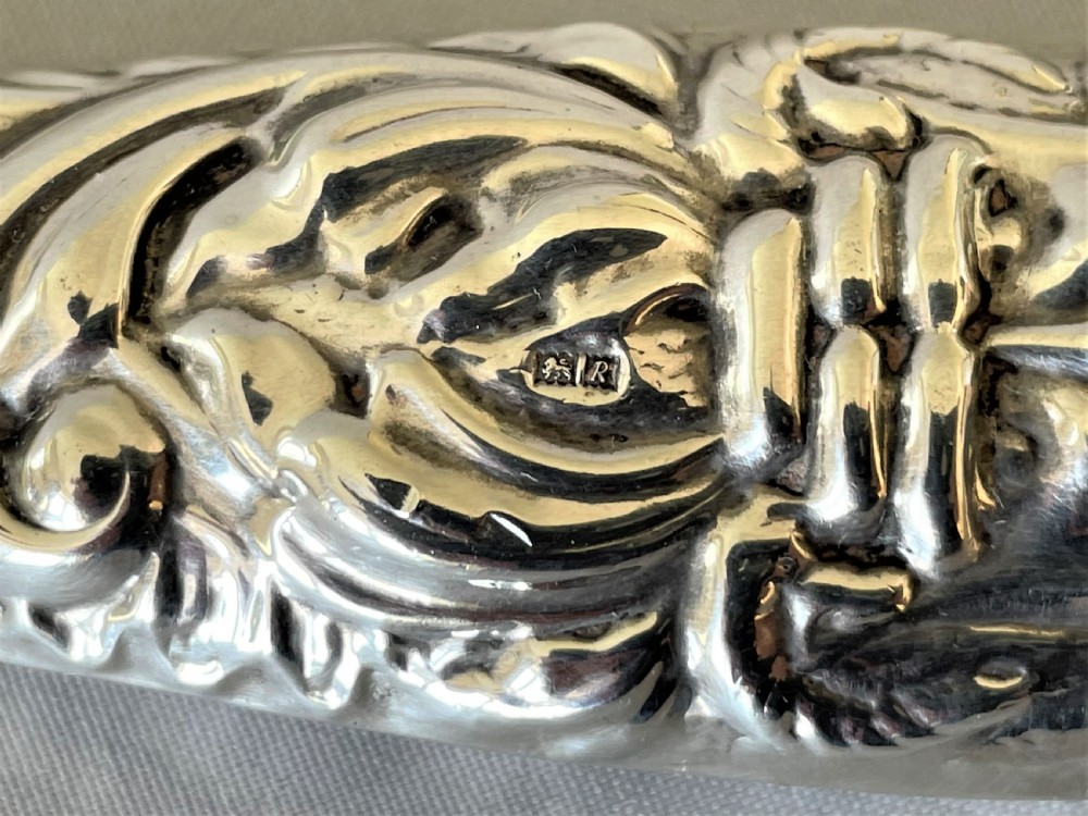 A gorgeous vintage silver hand mirror View V