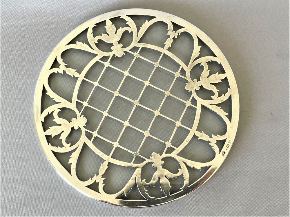 A lovely silver & glass teapot stand/coaster View II