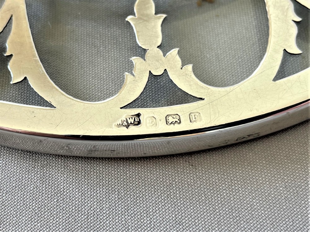 A lovely silver & glass teapot stand/coaster View III
