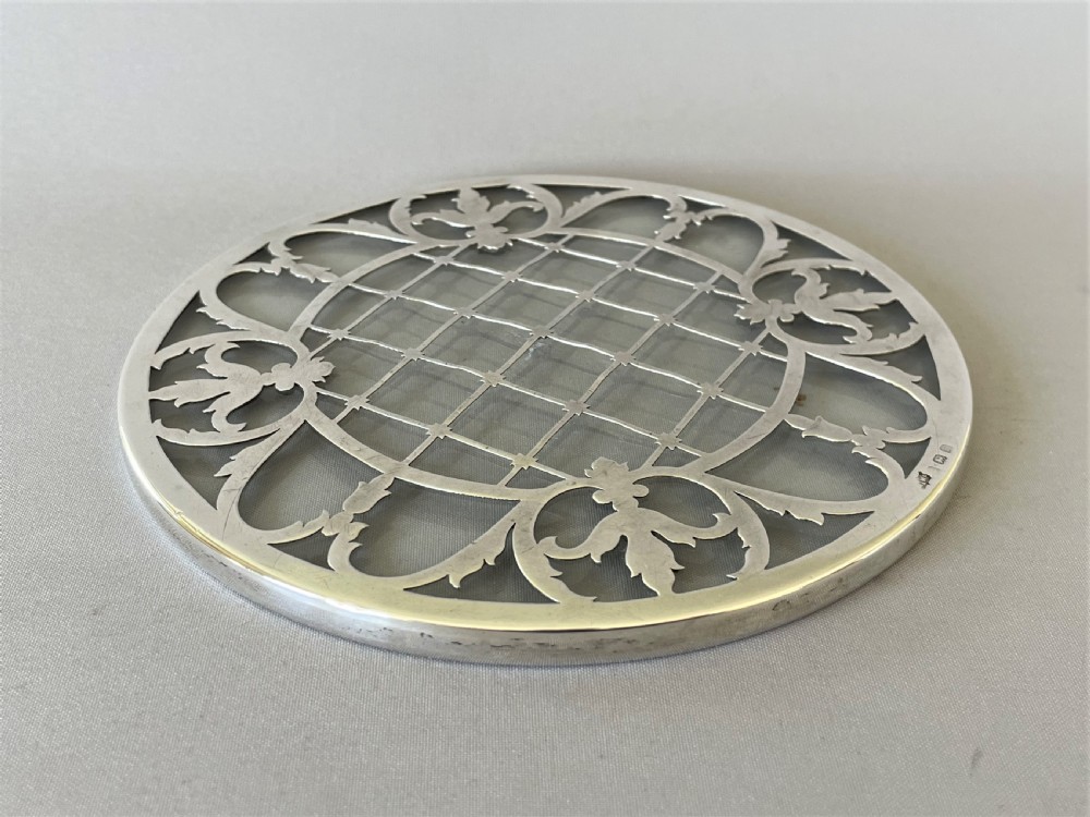 A lovely silver & glass teapot stand/coaster View IV