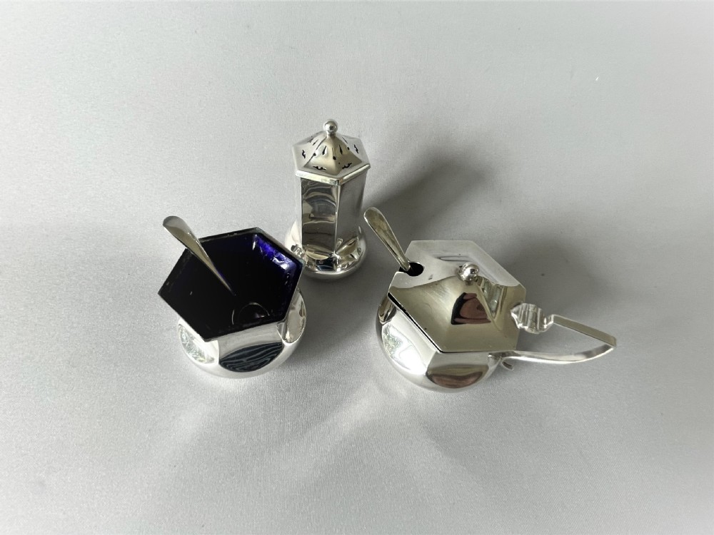 A Stylish Art Deco Three Piece Silver Cruet & Spoons View II