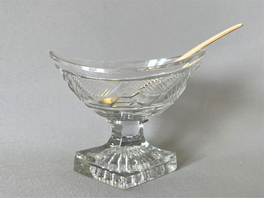  A superb Georgian cut glass boat salt with period silver gilt spoon View II