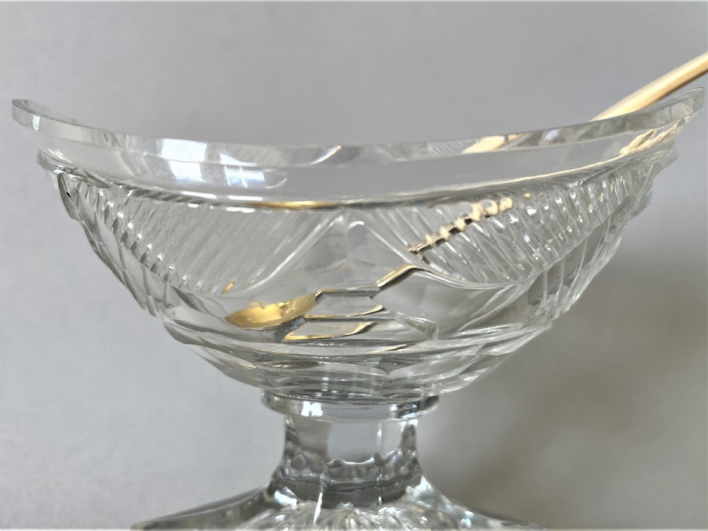  A superb Georgian cut glass boat salt with period silver gilt spoon View V