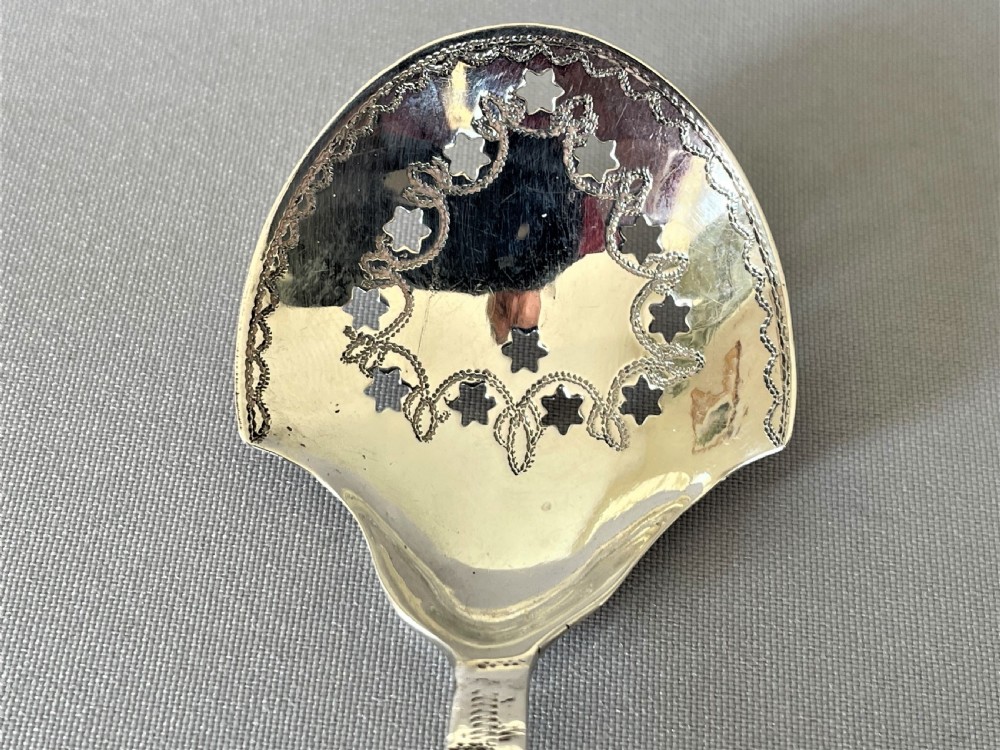 An unusual Georgian pierced silver tea caddy spoon View III