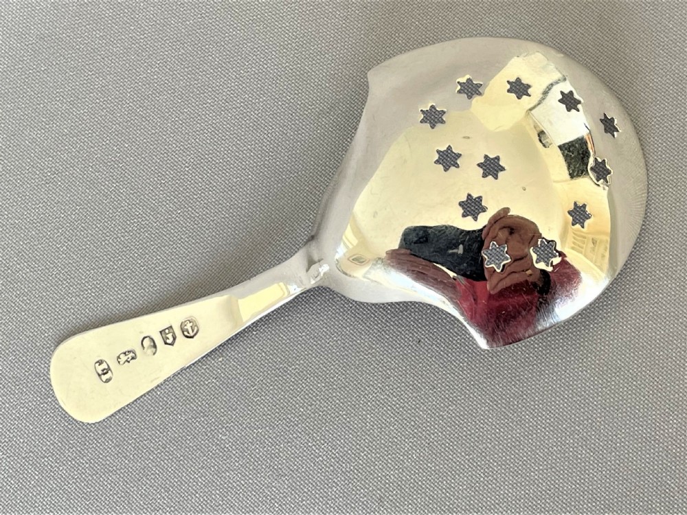 An unusual Georgian pierced silver tea caddy spoon View V