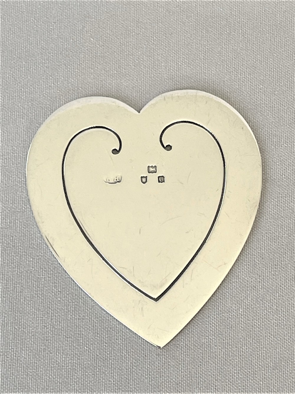 A lovely Victorian silver heart shaped bookmark