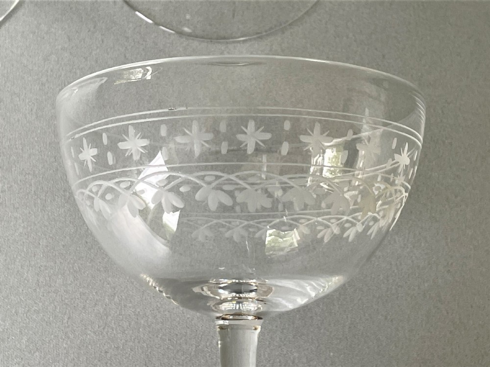 A lovely set of 6 Victorian etched glass champagne coupes View VI