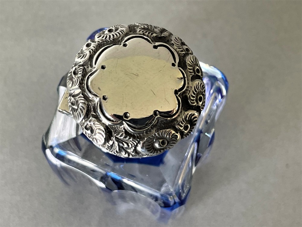 A gorgeous silver mounted flashed blue scent bottle View V