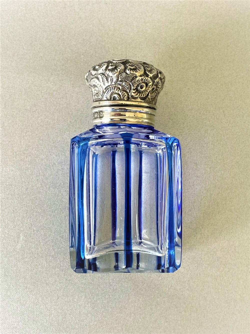 A gorgeous silver mounted flashed blue scent bottle View VII