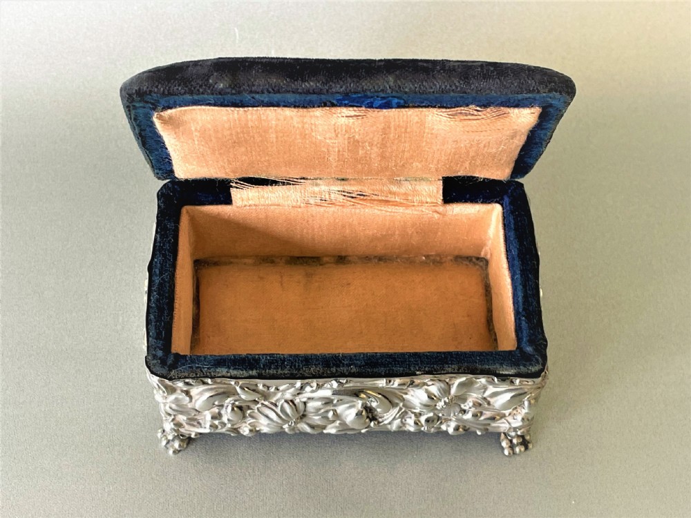 A lovely silver cased trinket box with pin cushion lid View IV