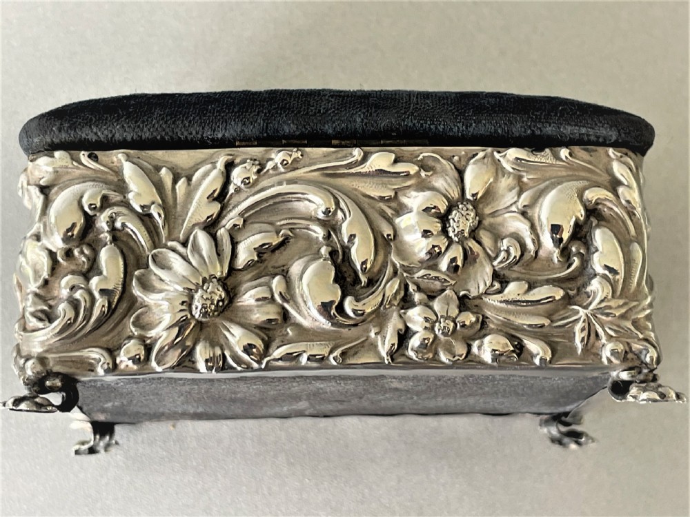 A lovely silver cased trinket box with pin cushion lid View VII