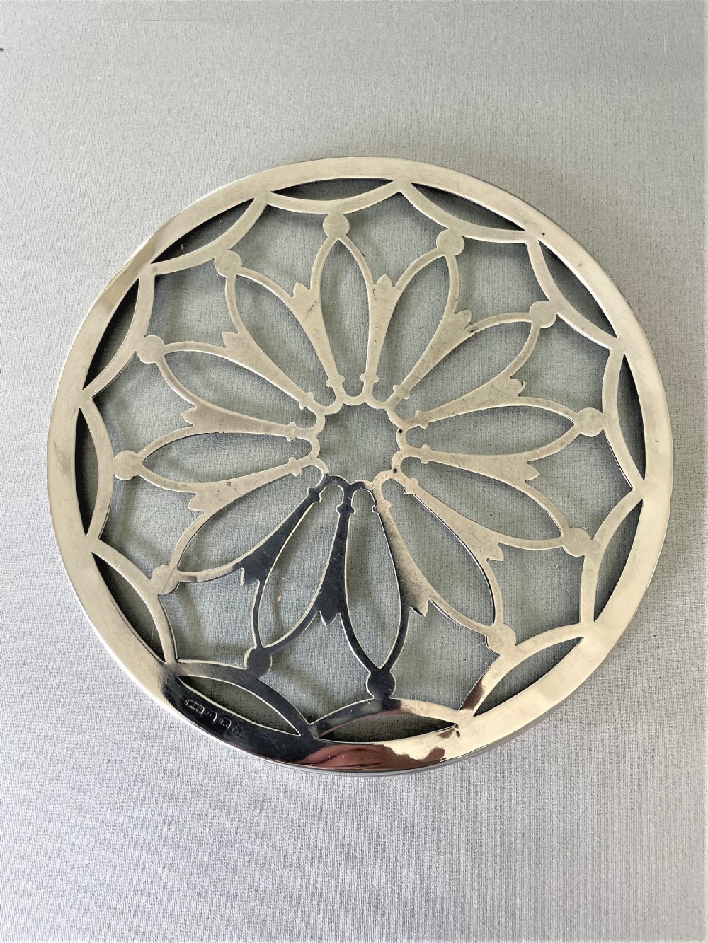 A gorgeous silver mounted teapot stand/coaster View II
