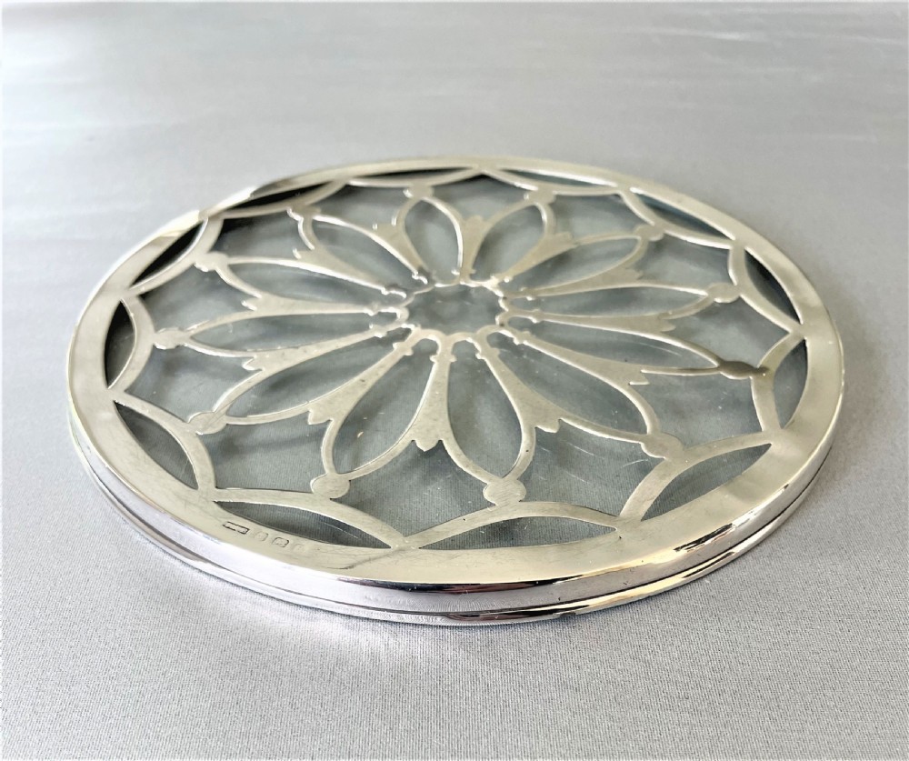 A gorgeous silver mounted teapot stand/coaster View III