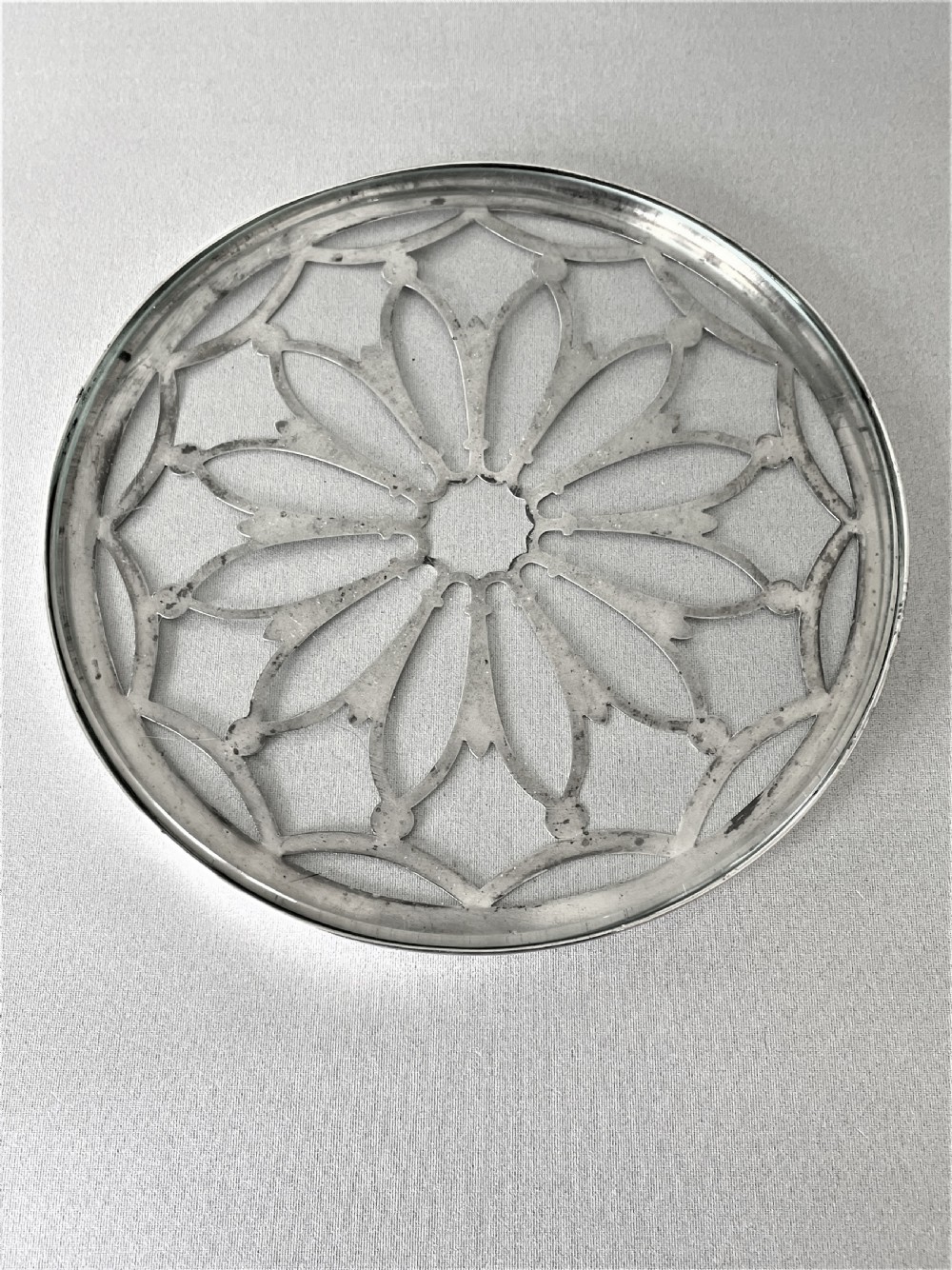 A gorgeous silver mounted teapot stand/coaster View V