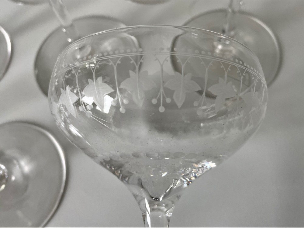 An extremely rare set of 12 Victorian etched champagne glasses View V