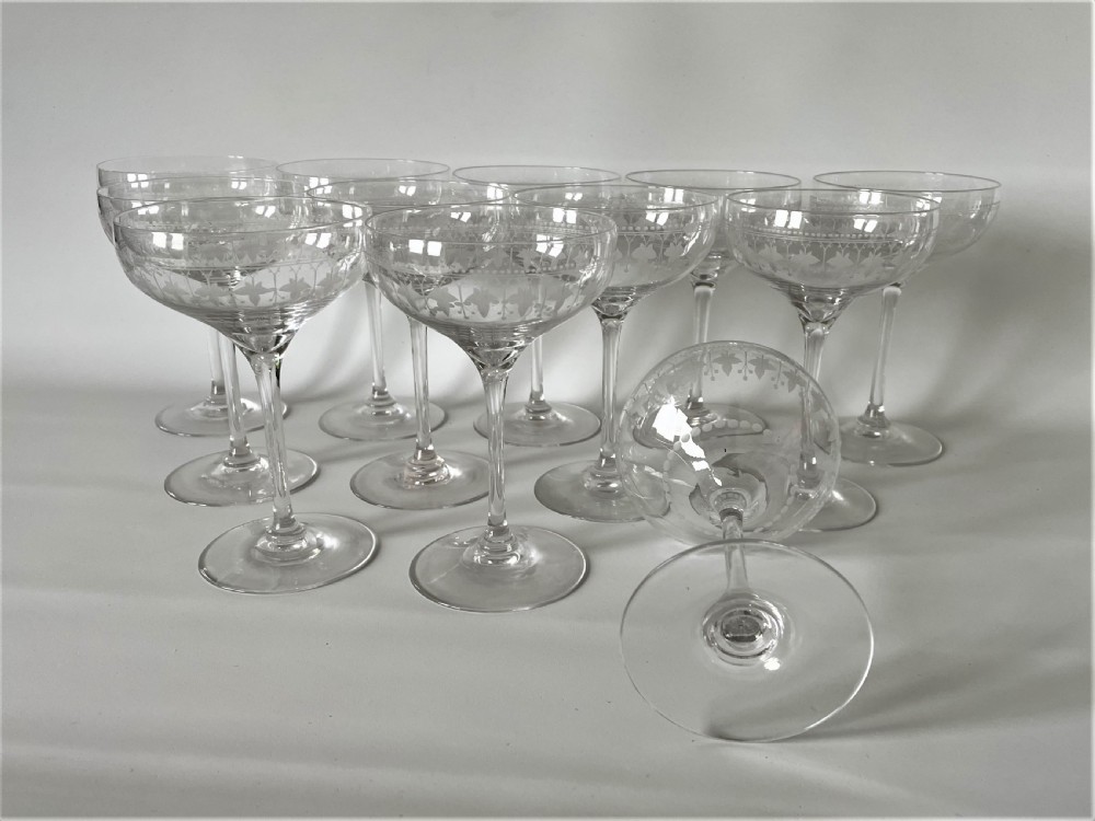 An extremely rare set of 12 Victorian etched champagne glasses View VI