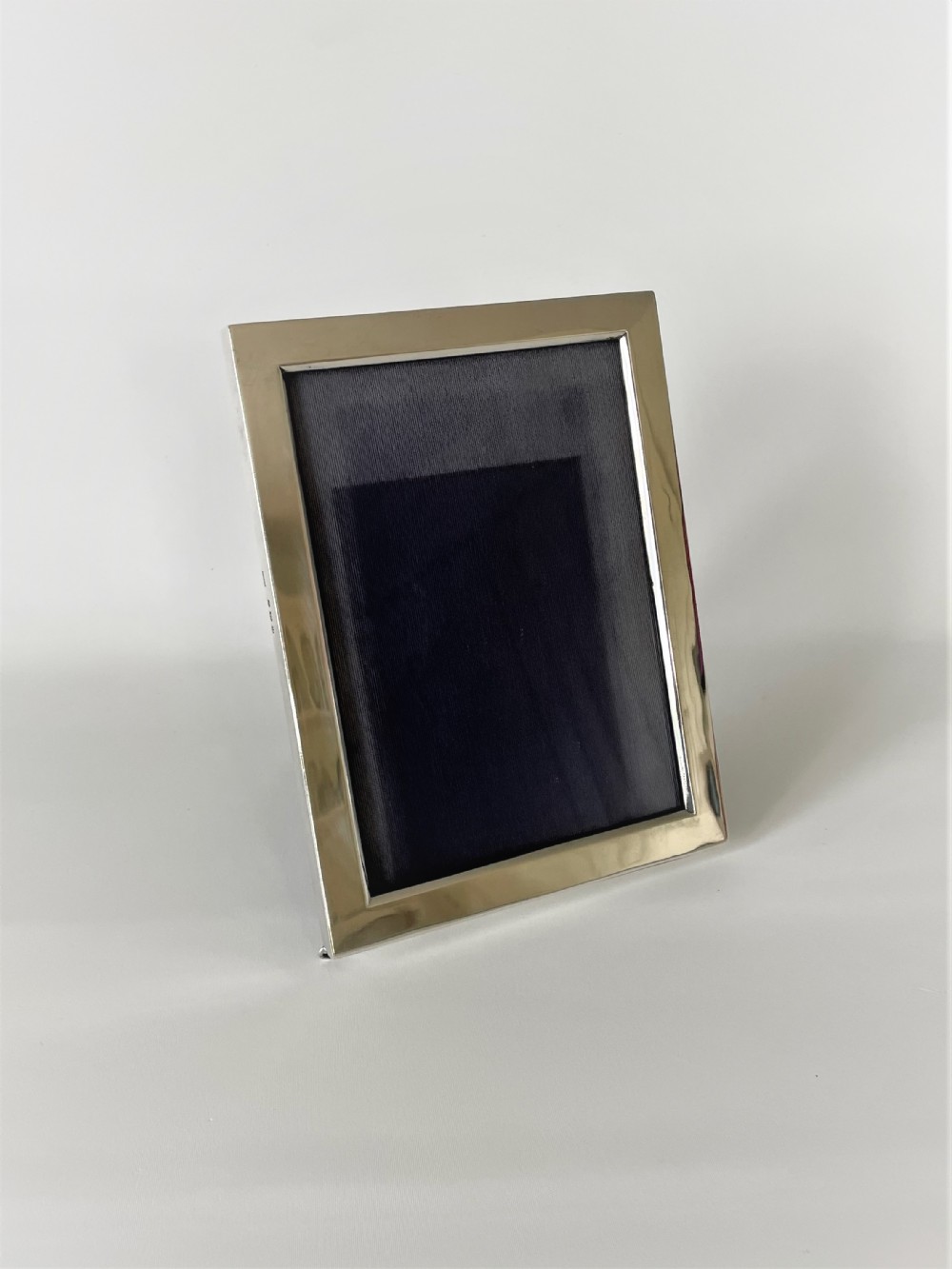 A handsome early George V silver photo frame