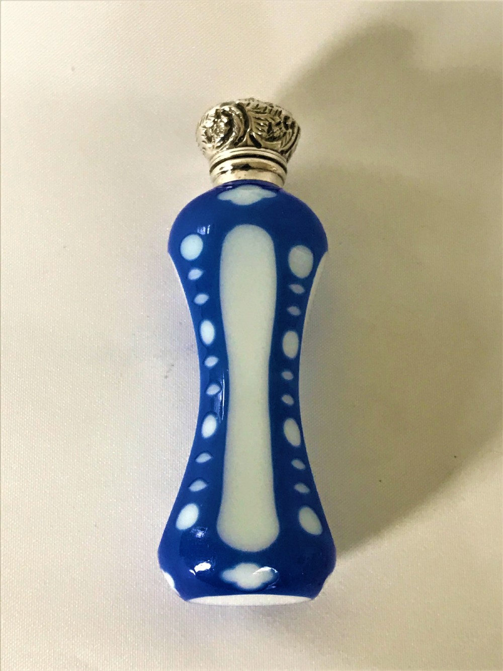 A rare Victorian silver mounted glass overlay scent bottle View II