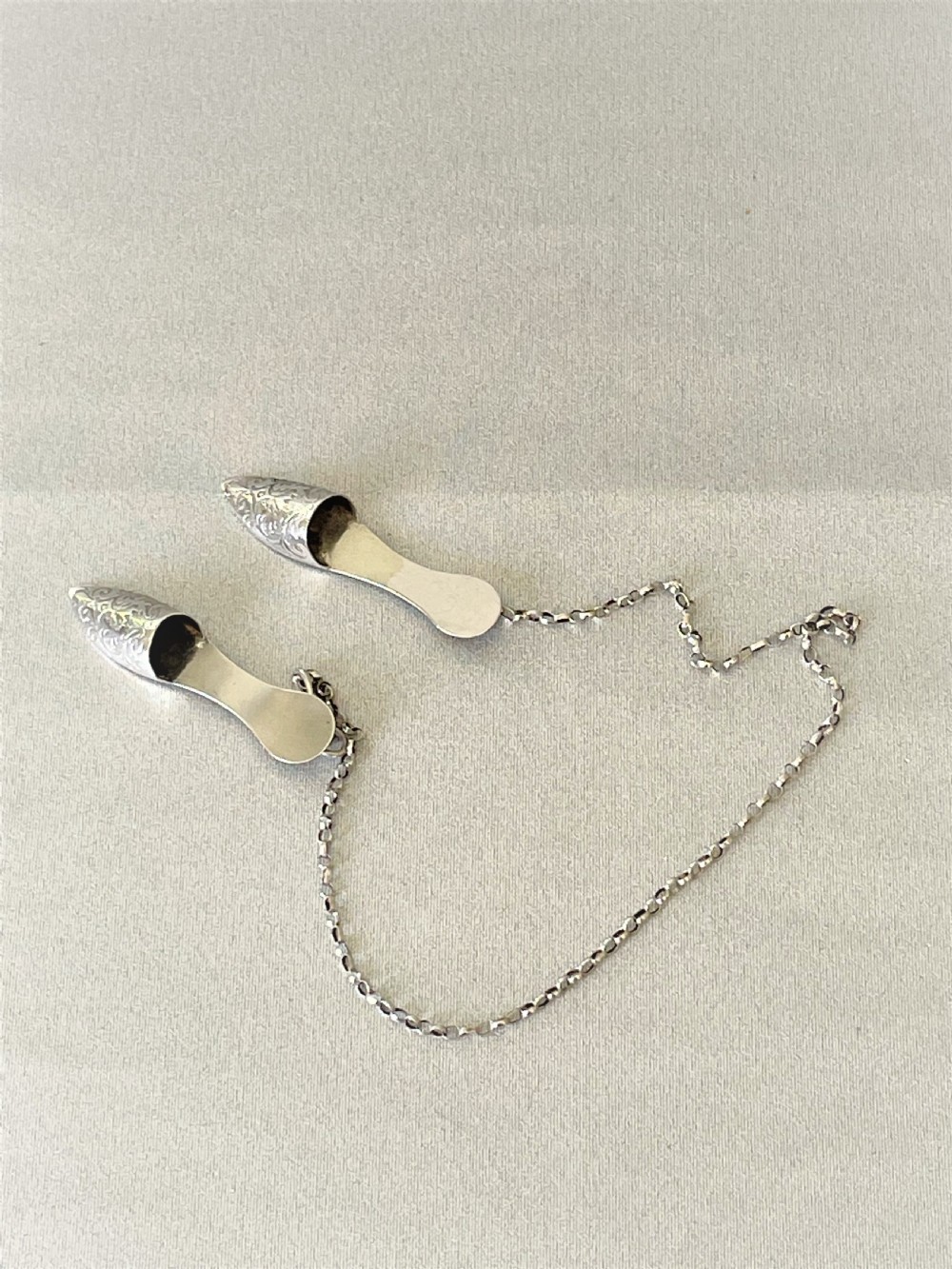 A rare pair of Georgian silver novelty needle guards