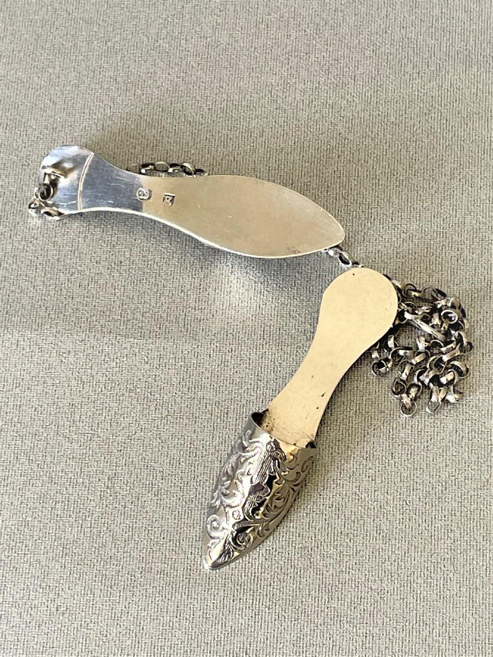A rare pair of Georgian silver novelty needle guards View III